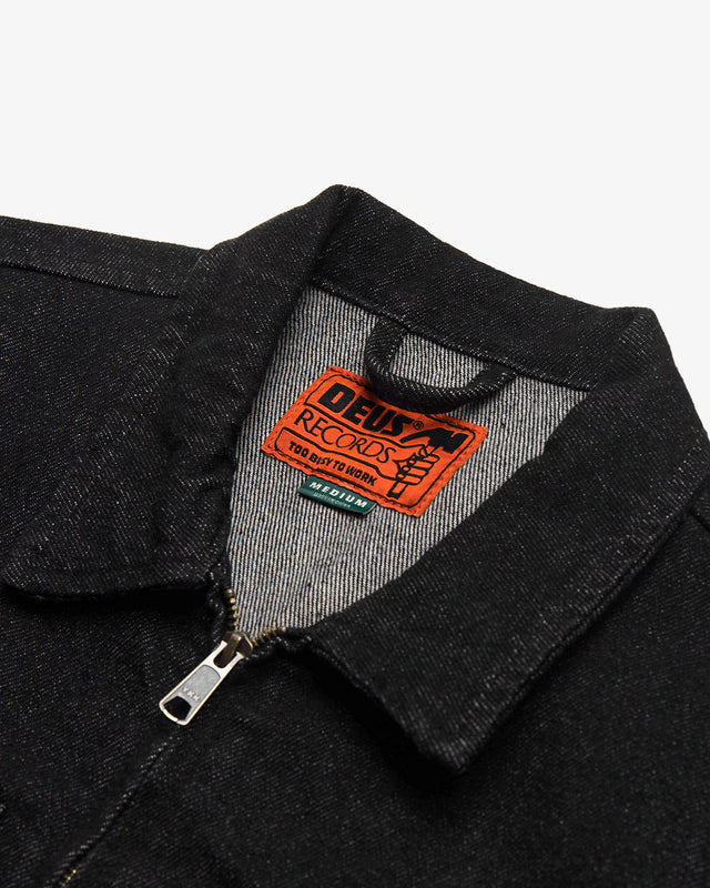 black relaxed fit jacket with black oversized chest pockets, woven label, branded shank buttons and front welt pockets in black 100% cotton denim twill