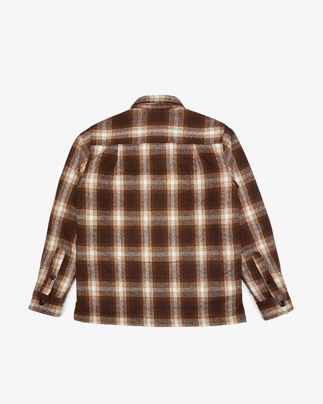 relaxed fit overshirt with yarn dyed check and chest branded label, quilted padded lining, wool and poly blend fabrication with light garment wash