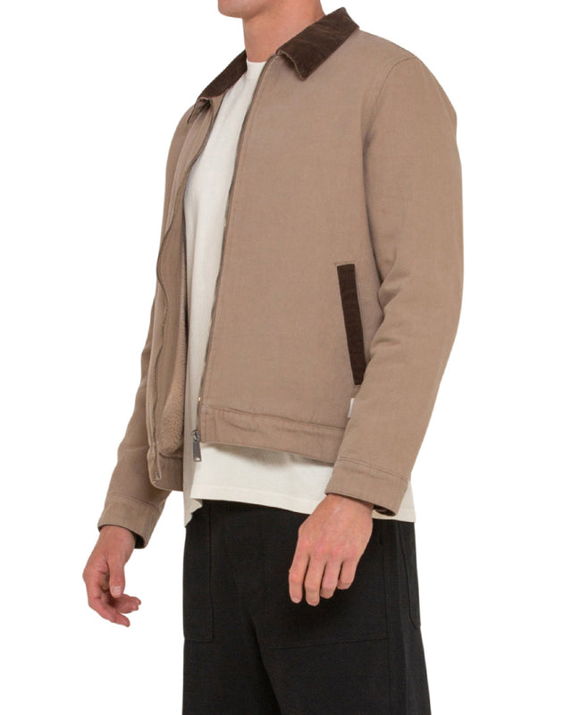 tan regular fit jacket with branded woven label at hem, contrast corduroy collar and pockets, sherpa lining, 100% cotton canvas fabrication with a heavy stone wash