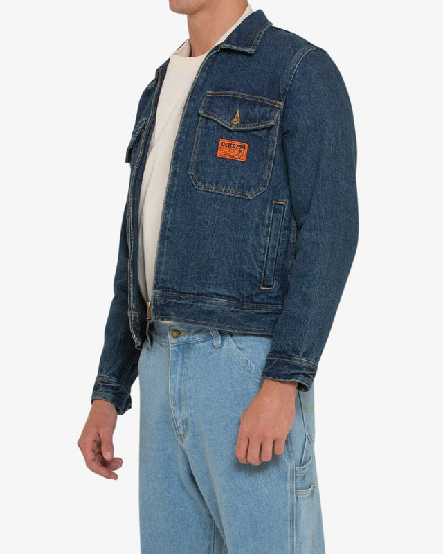 rinse washed blue relaxed fit jacket with oversized chest pockets, woven label, branded shank buttons and front welt pockets in 100% cotton denim twill